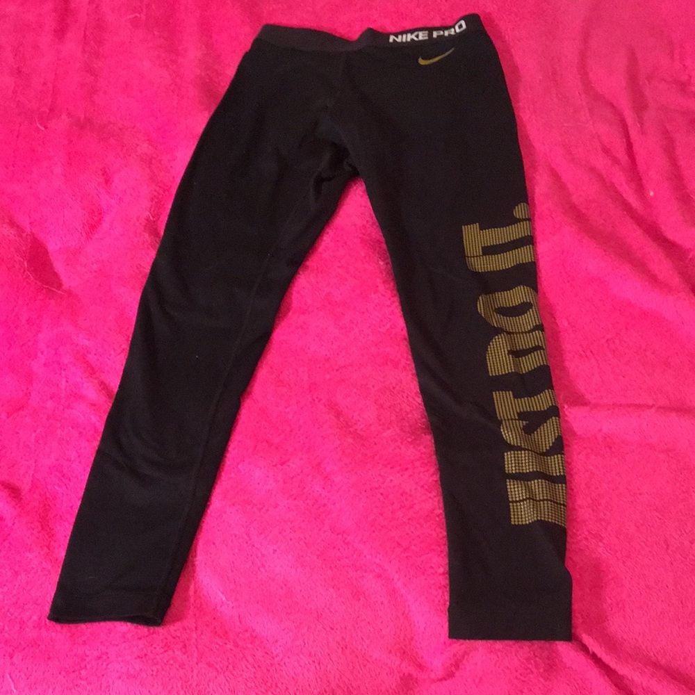 Nike Black and Gold Leggings for Active Wear